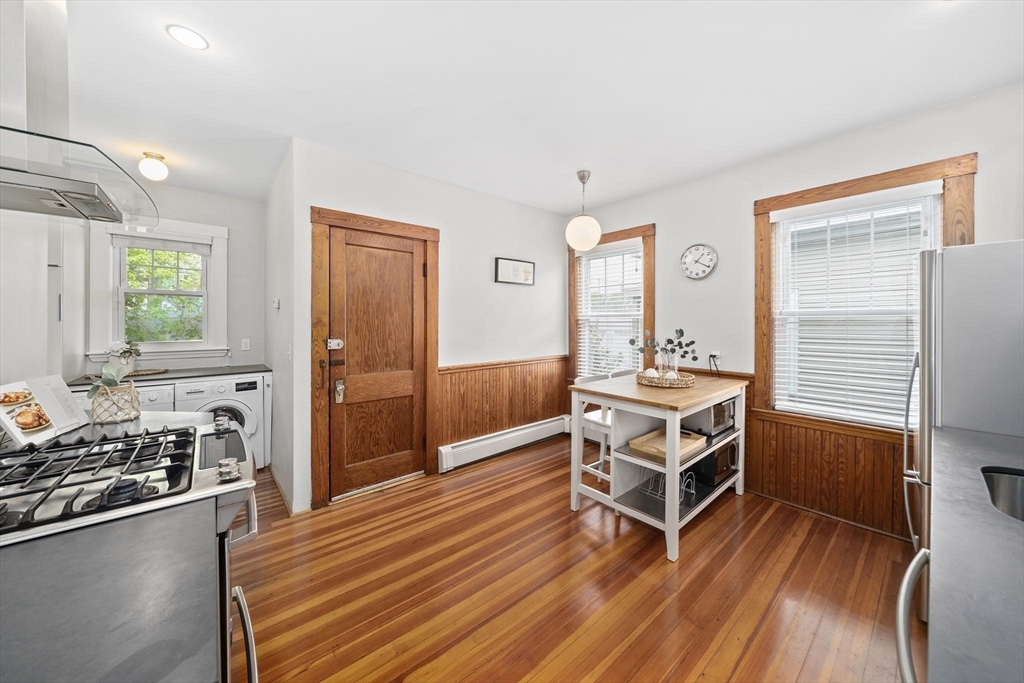 75 Parkton Road, Unit 3 Boston, MA 02130 - Photo 10 of 40 a room with wooden floor and window