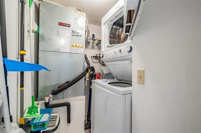 a view of storage and utility room with washer and dryer