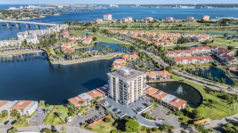 an aerial view of a residential houses with outdoor space