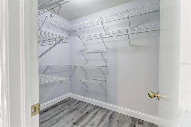 a view of a room with racks on the wall