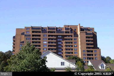 111 Hamlet Hill Road, Unit 1304 Baltimore, MD 21210 - Photo 1 of 17 a view of a building with a street