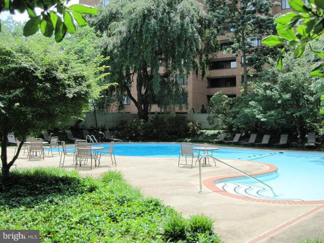 111 Hamlet Hill Road, Unit 1304 Baltimore, MD 21210 - Photo 13 of 17 a view of a swimming pool with a patio
