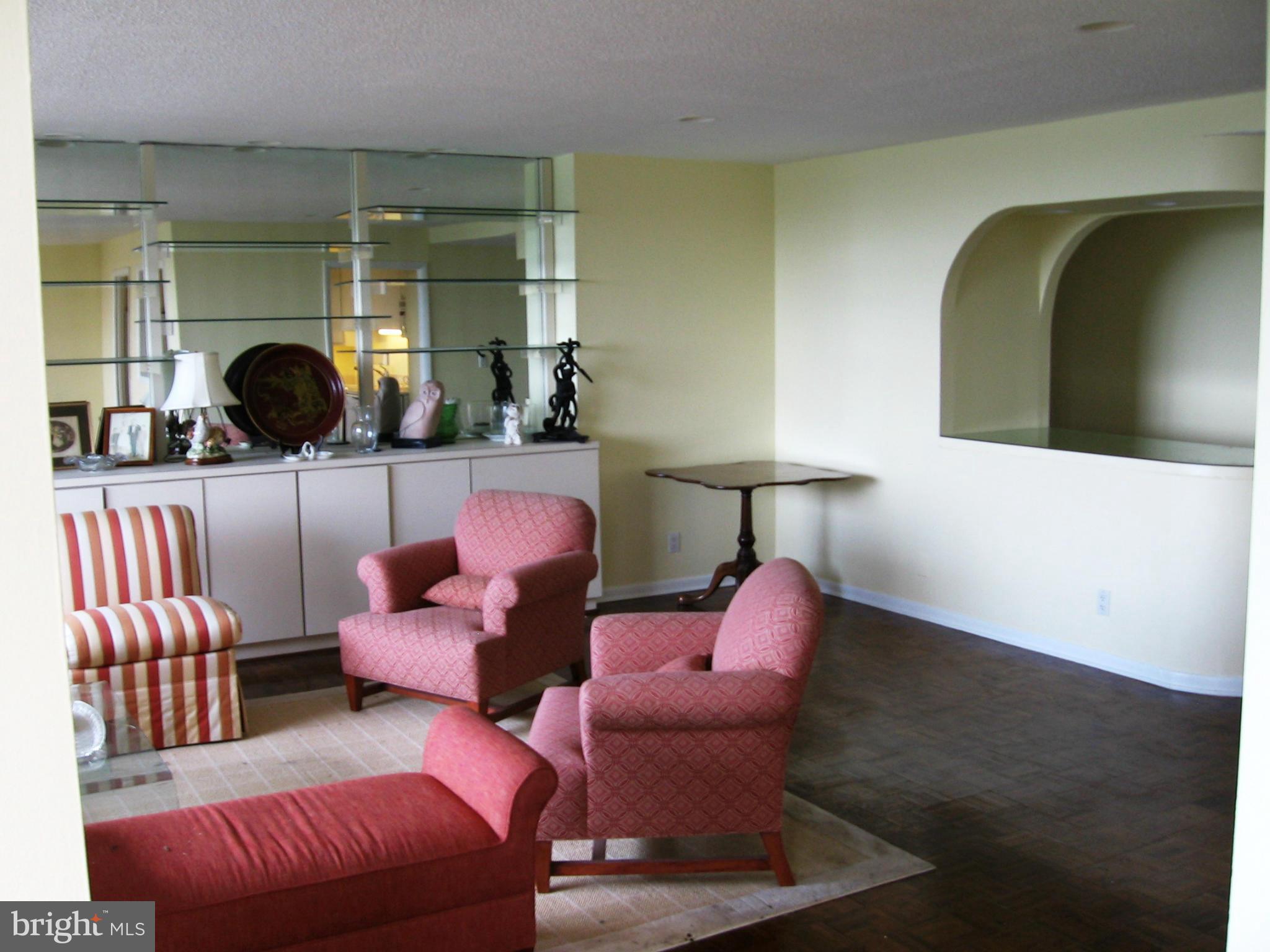 111 Hamlet Hill Road, Unit 1304 Baltimore, MD 21210 - Photo 4 of 17 a living room with furniture