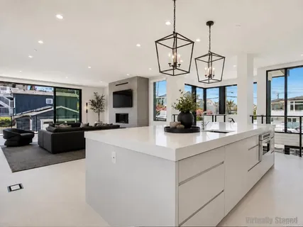a kitchen with a table and chairs in it