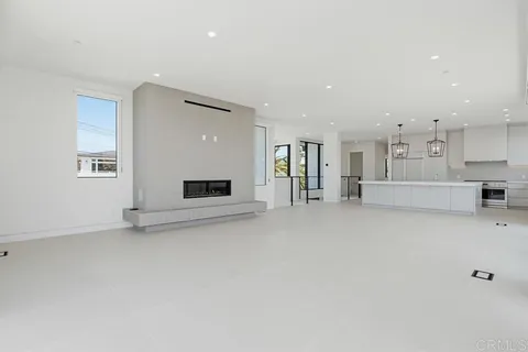 a stove top oven sitting inside of a kitchen