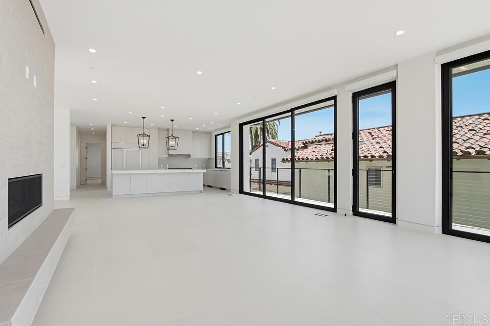 206 4th Street Encinitas, CA 92024 - Photo 14 of 64 an empty room with windows and closet