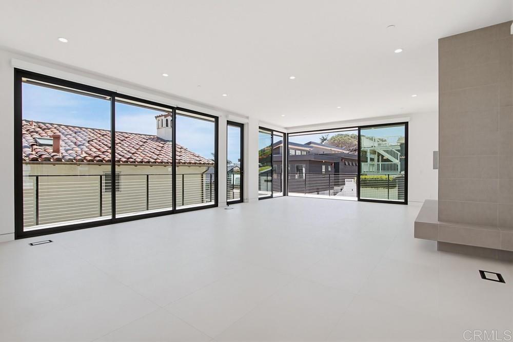 206 4th Street Encinitas, CA 92024 - Photo 22 of 64 a view of an empty room with a sliding door