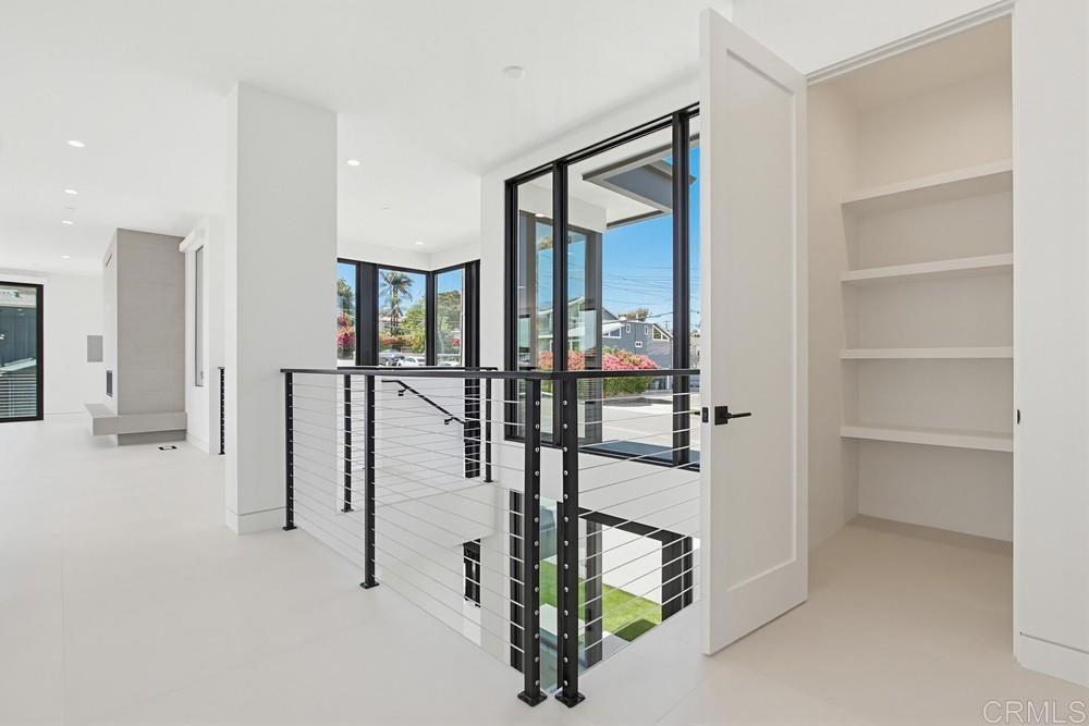 206 4th Street Encinitas, CA 92024 - Photo 23 of 64 a view of a livingroom with a furniture and floor to ceiling window