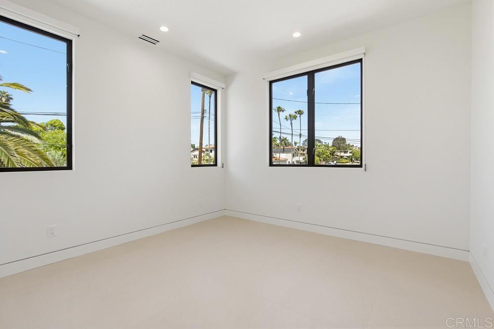206 4th Street Encinitas, CA 92024 - Photo 37 of 64 an empty room with windows and window