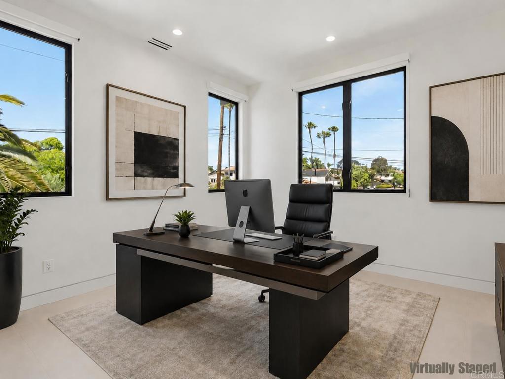 206 4th Street Encinitas, CA 92024 - Photo 38 of 64 a living room with furniture and a flat screen tv