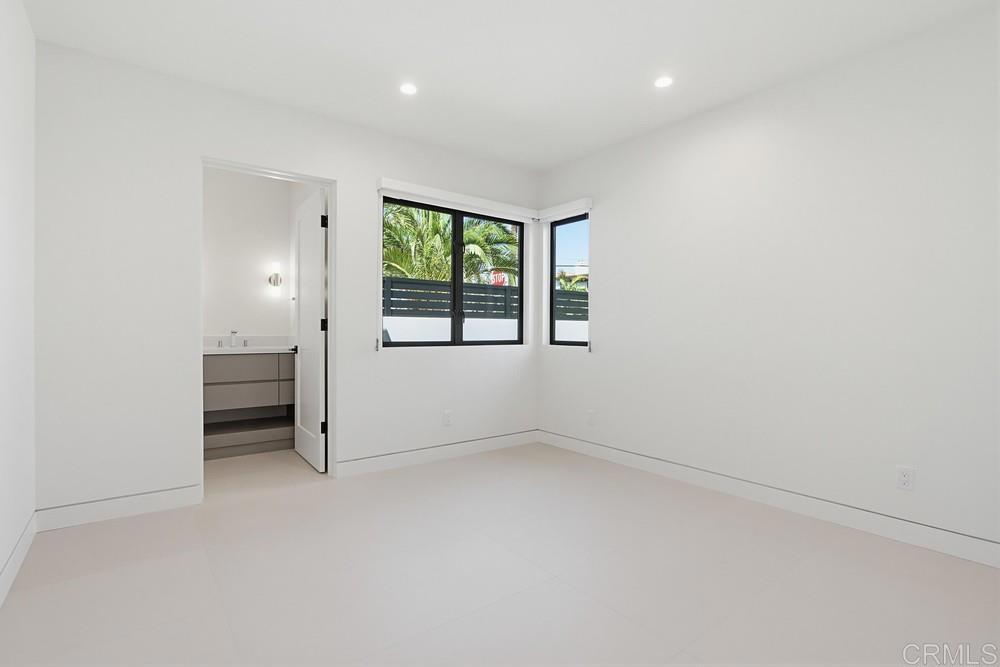 206 4th Street Encinitas, CA 92024 - Photo 44 of 64 an empty room with a window