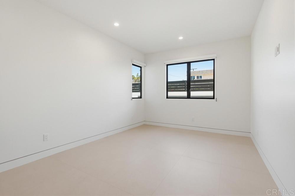 206 4th Street Encinitas, CA 92024 - Photo 46 of 64 an empty room with a window