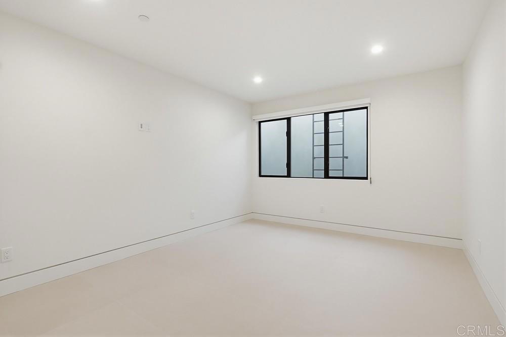 206 4th Street Encinitas, CA 92024 - Photo 51 of 64 an empty room with a window