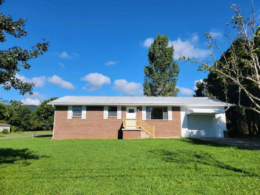 1084 Cemetery Road Spring City, TN 37381 - Photo 1 of 39 1