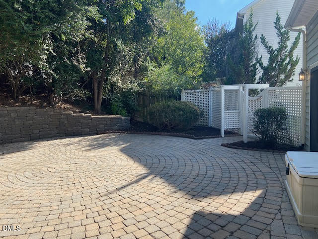 Undisclosed Address Raleigh, NC 27610 - Photo 6 of 14 a view of backyard with plants and trees