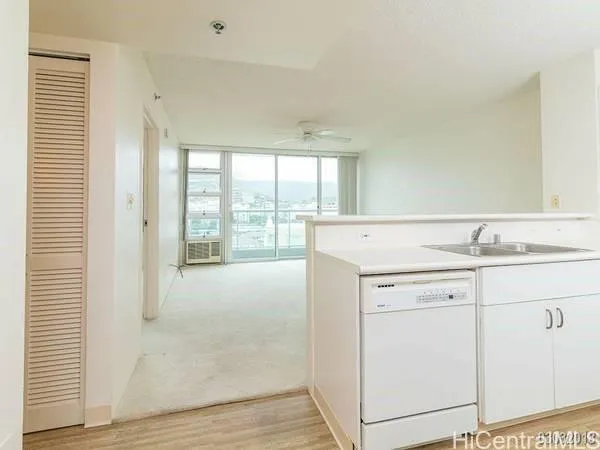 a view of vanity a sink and a window