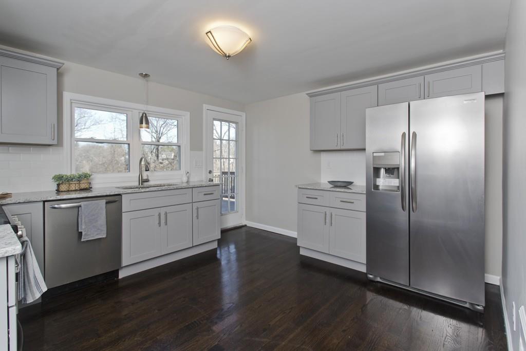 90 Darling Street Springfield, MA 01151 - Photo 1 of 42 a kitchen with a refrigerator sink and cabinets