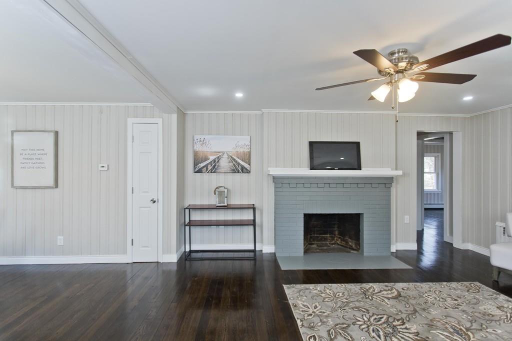 90 Darling Street Springfield, MA 01151 - Photo 12 of 42 a living room with furniture and a fireplace