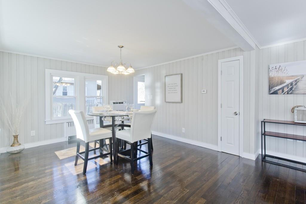 90 Darling Street Springfield, MA 01151 - Photo 13 of 42 a view of a a dining room with furniture window and wooden floor