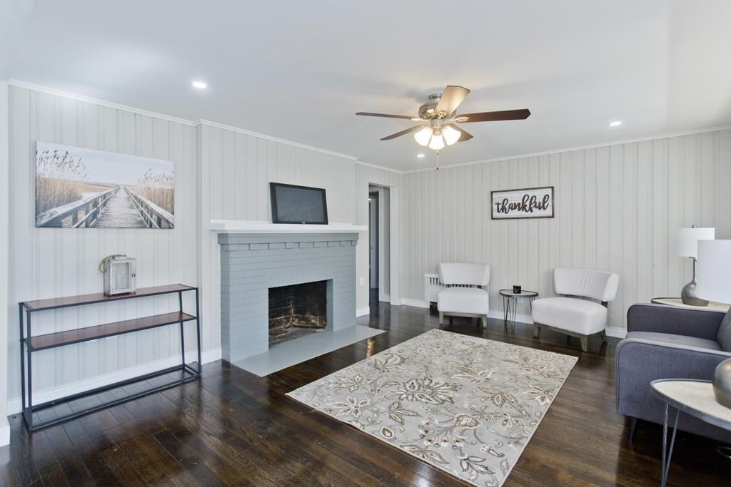 90 Darling Street Springfield, MA 01151 - Photo 14 of 42 a living room with furniture and a fireplace