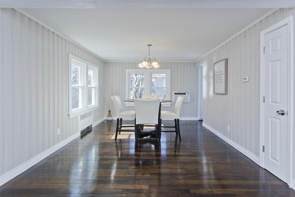 90 Darling Street Springfield, MA 01151 - Photo 19 of 42 a view of a dining room with furniture window and wooden floor