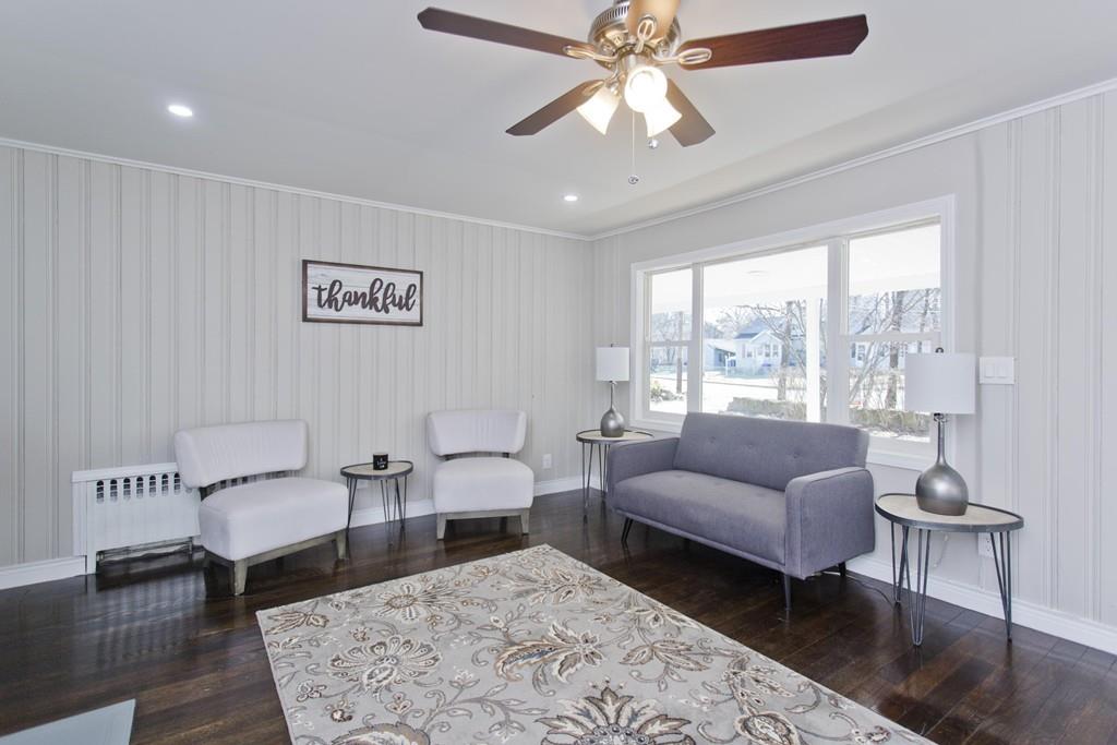 90 Darling Street Springfield, MA 01151 - Photo 20 of 42 a living room with furniture and a large window