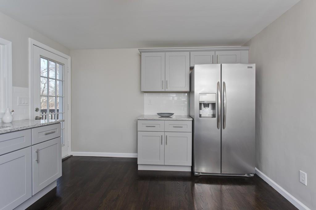90 Darling Street Springfield, MA 01151 - Photo 2 of 42 a kitchen with stainless steel appliances a refrigerator sink and cabinets