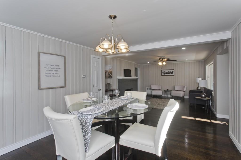 90 Darling Street Springfield, MA 01151 - Photo 23 of 42 a view of a dining room with furniture and wooden floor