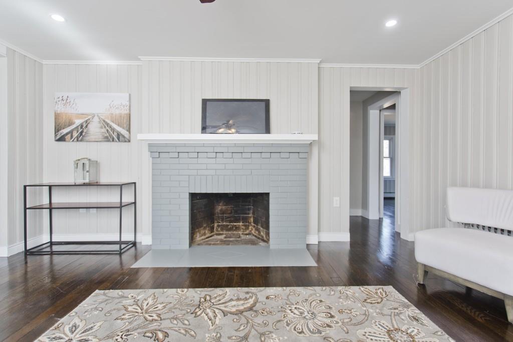 90 Darling Street Springfield, MA 01151 - Photo 24 of 42 a living room with furniture and a fireplace