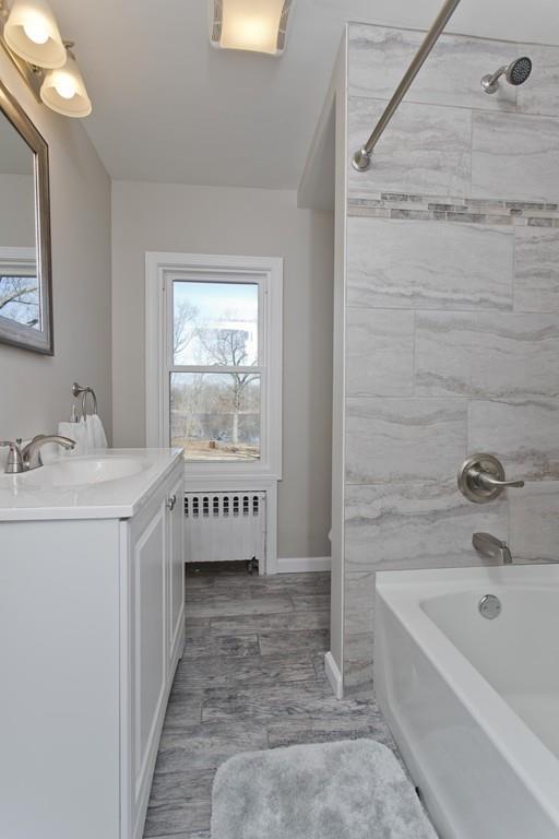 90 Darling Street Springfield, MA 01151 - Photo 30 of 42 a bathroom with a bathtub and a sink