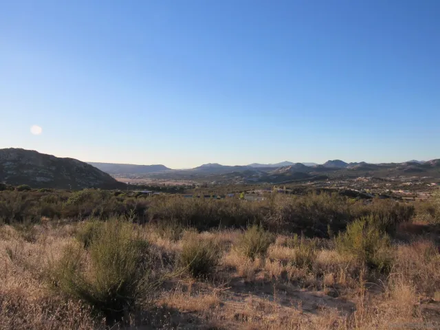 a view of lake with mountain