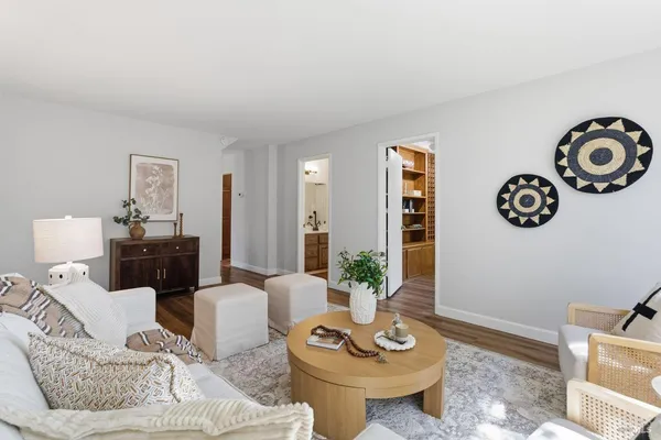 a work room with furniture and a window