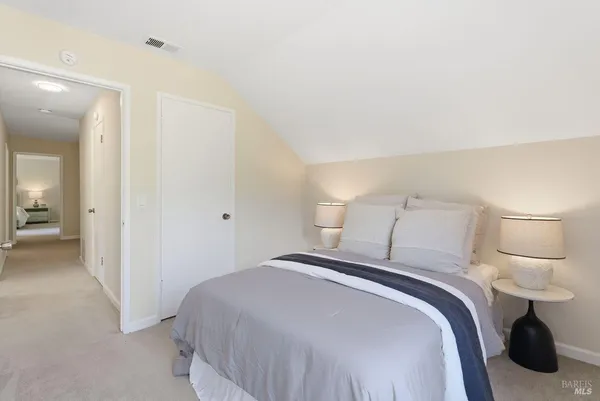 a view of swimming pool with chairs in patio