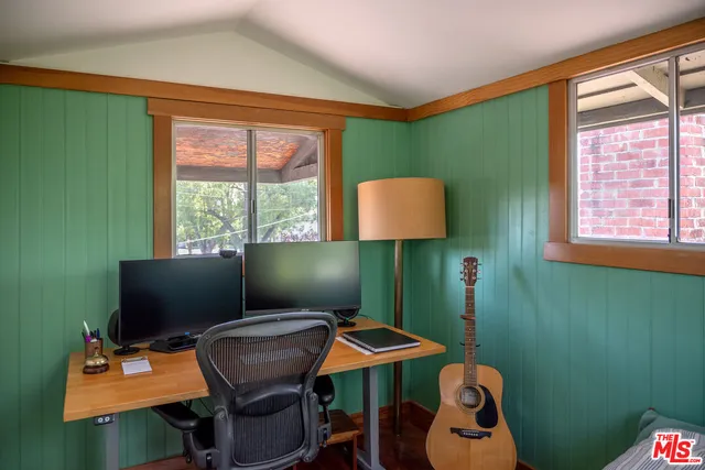 a room with furniture and a window