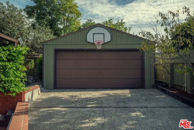 a front view of a house with a garage