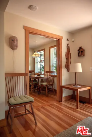 a view of a livingroom with furniture and a table