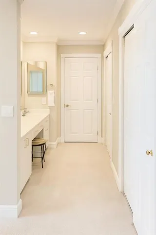 a bathroom with a bathtub and a window