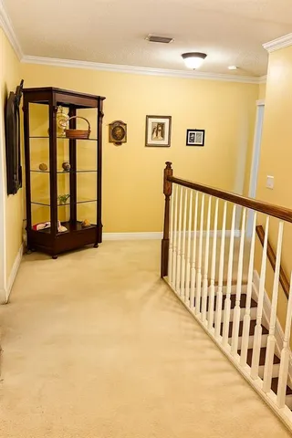 a bathroom with a sink mirror and a shower