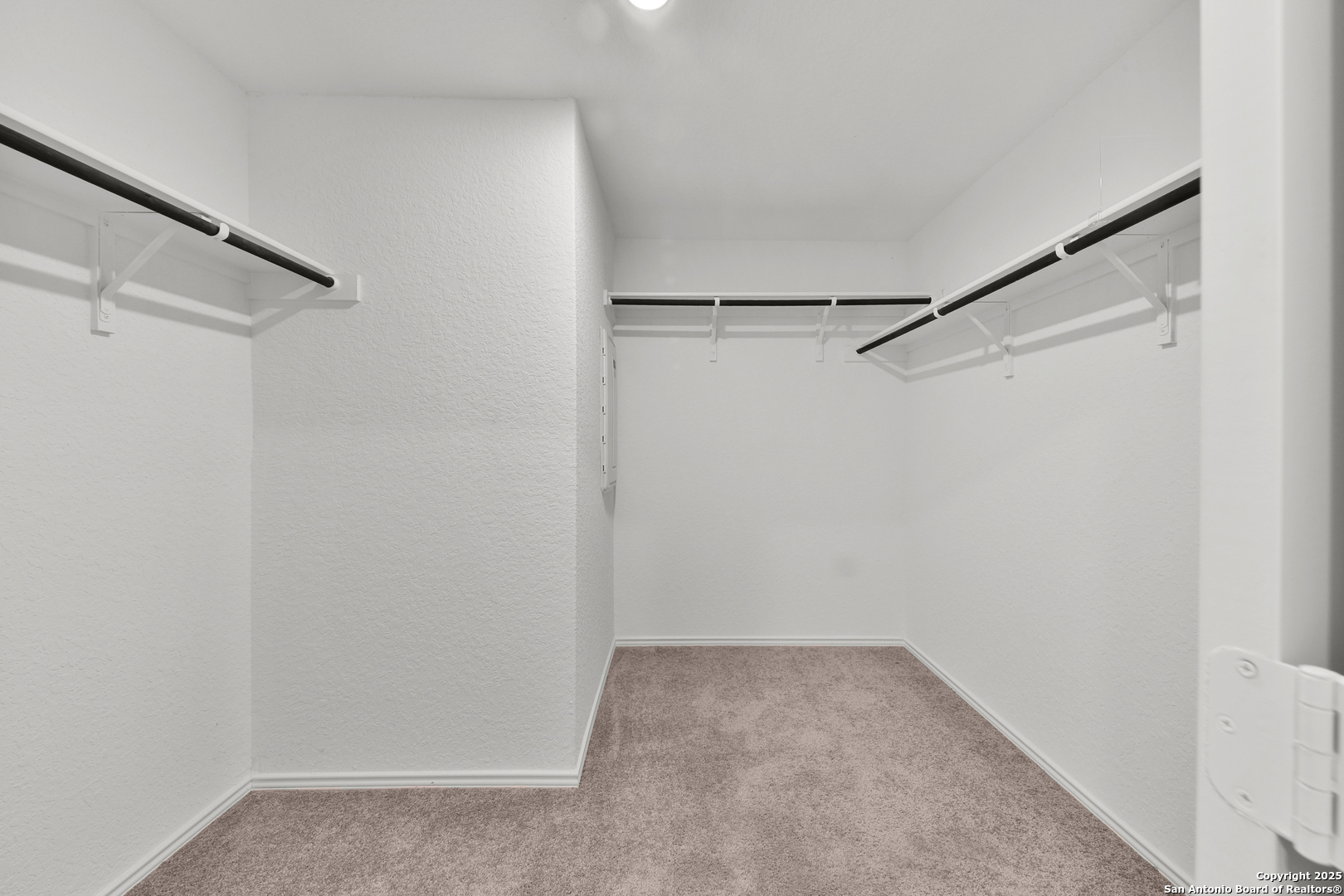 871 Landon Ridge San Antonio, TX 78253 - Photo 14 of 23 a view of a room with empty racks