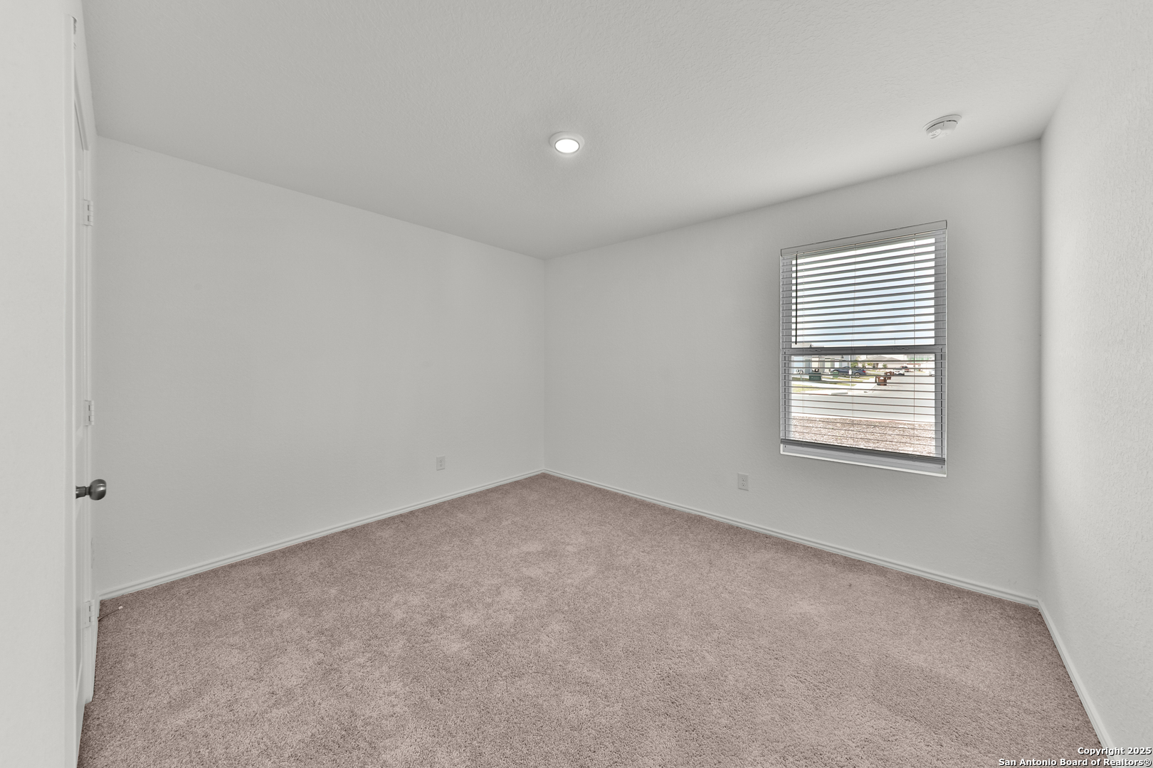 871 Landon Ridge San Antonio, TX 78253 - Photo 18 of 23 an empty room with windows
