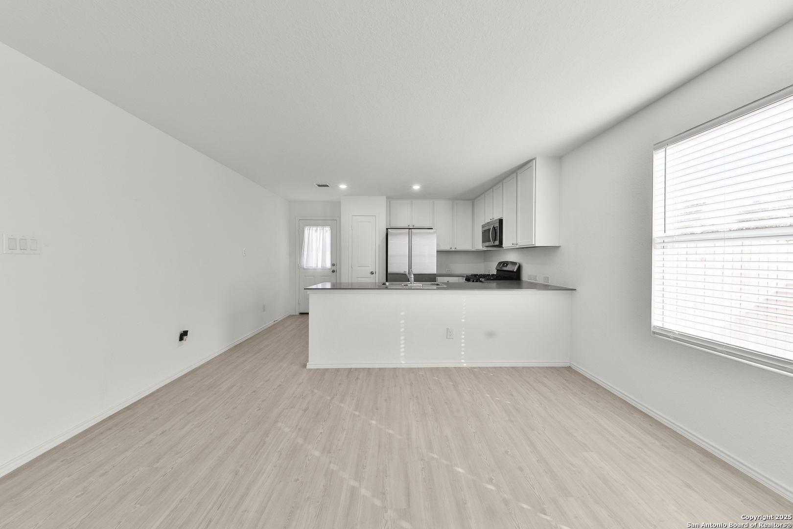 871 Landon Ridge San Antonio, TX 78253 - Photo 7 of 23 a view of kitchen with stainless steel appliances cabinets