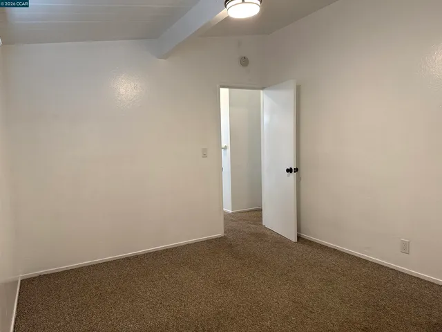 an empty room with an entryway