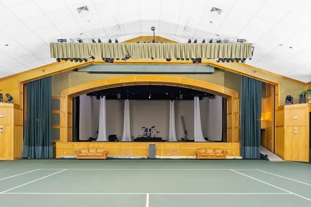 a bedroom with a bed and a cabinets