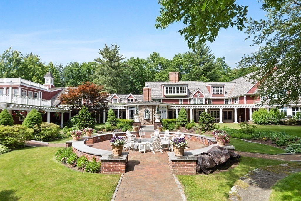 113 Juggler Meadow Road Leverett, MA 01054 - Photo 10 of 37 a front view of a house with garden and trees
