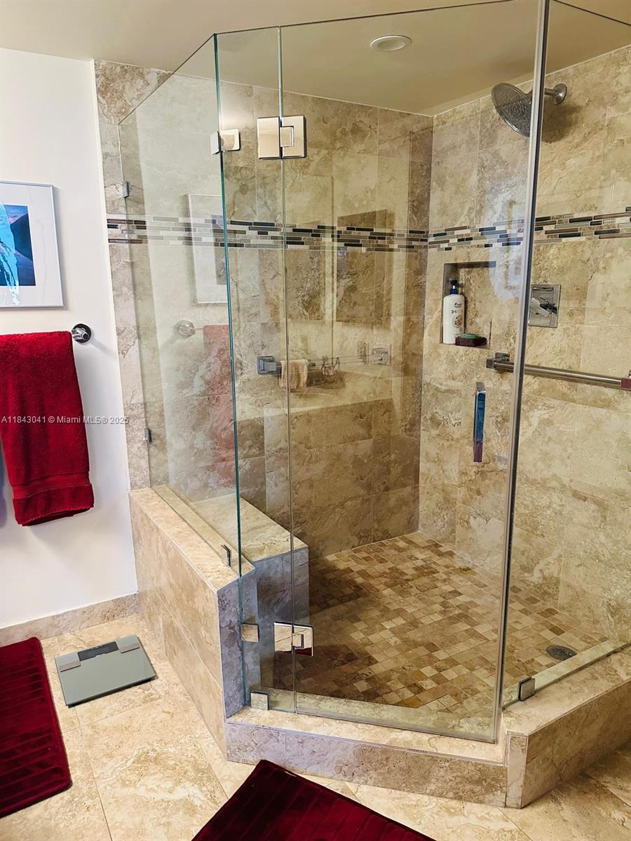 4000 Towerside Terrace, Unit 1503 Miami, FL 33138 - Photo 17 of 23 a bathroom with a shower