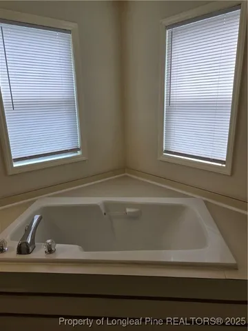 a bathroom with a sink and a bathtub