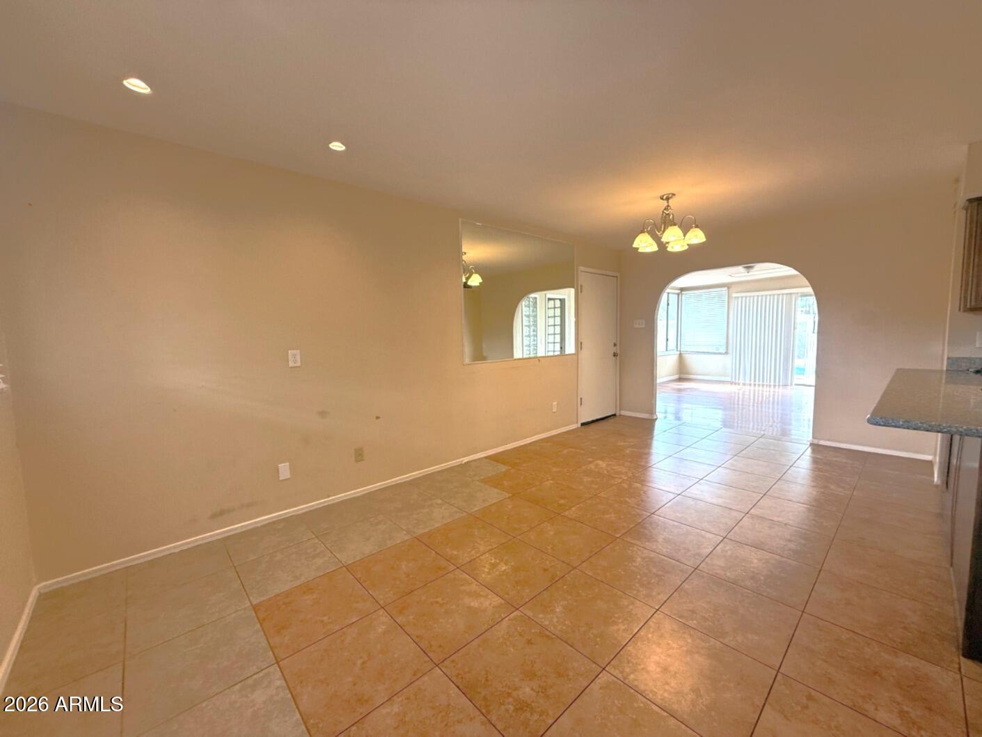 4625 South Rita Lane Tempe, AZ 85282 - Photo 2 of 16 a view of a livingroom with a window