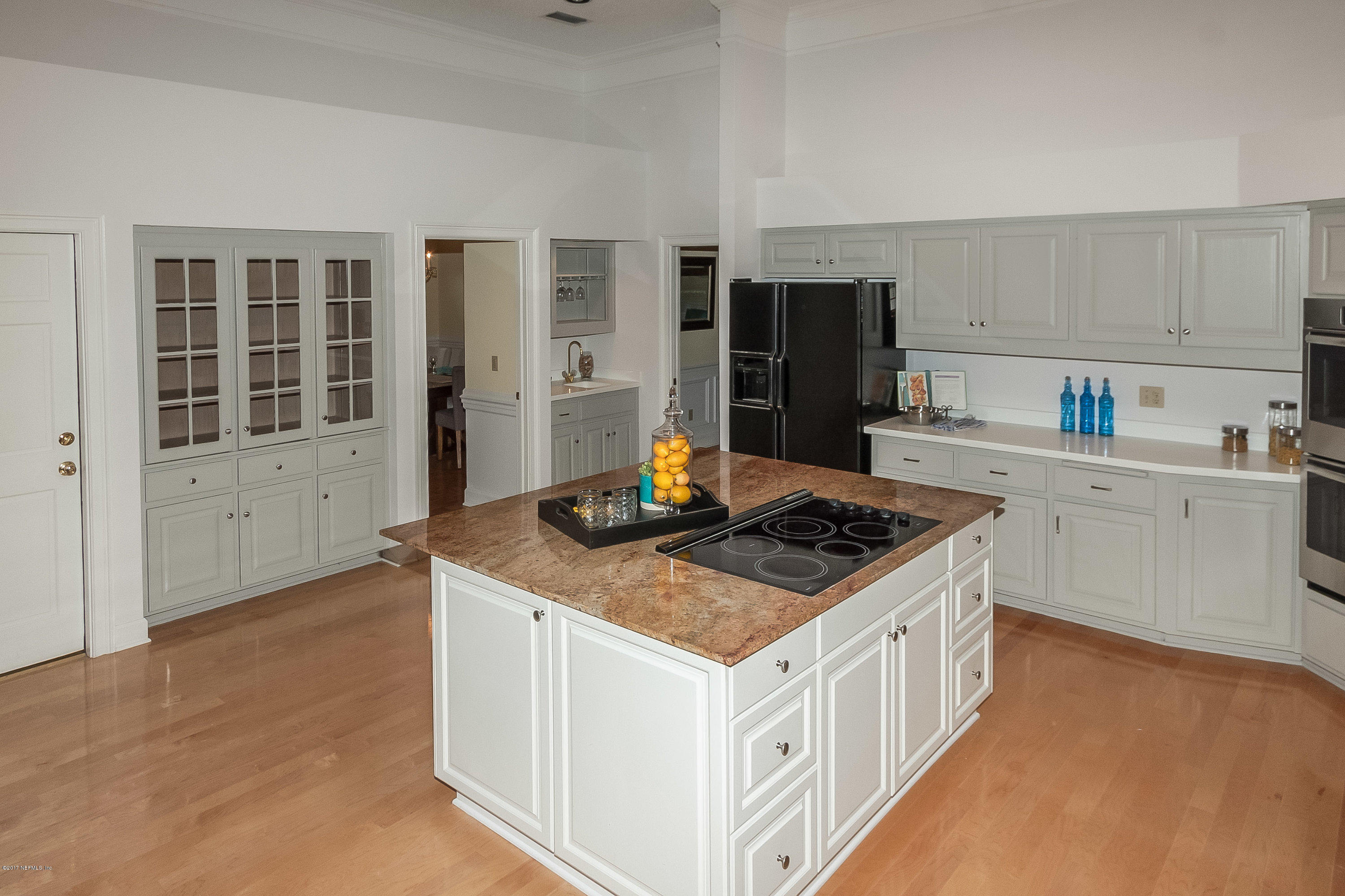 2720 Beauclerc Road Jacksonville, FL 32257 - Photo 21 of 45 a kitchen with stainless steel appliances granite countertop a sink stove and refrigerator