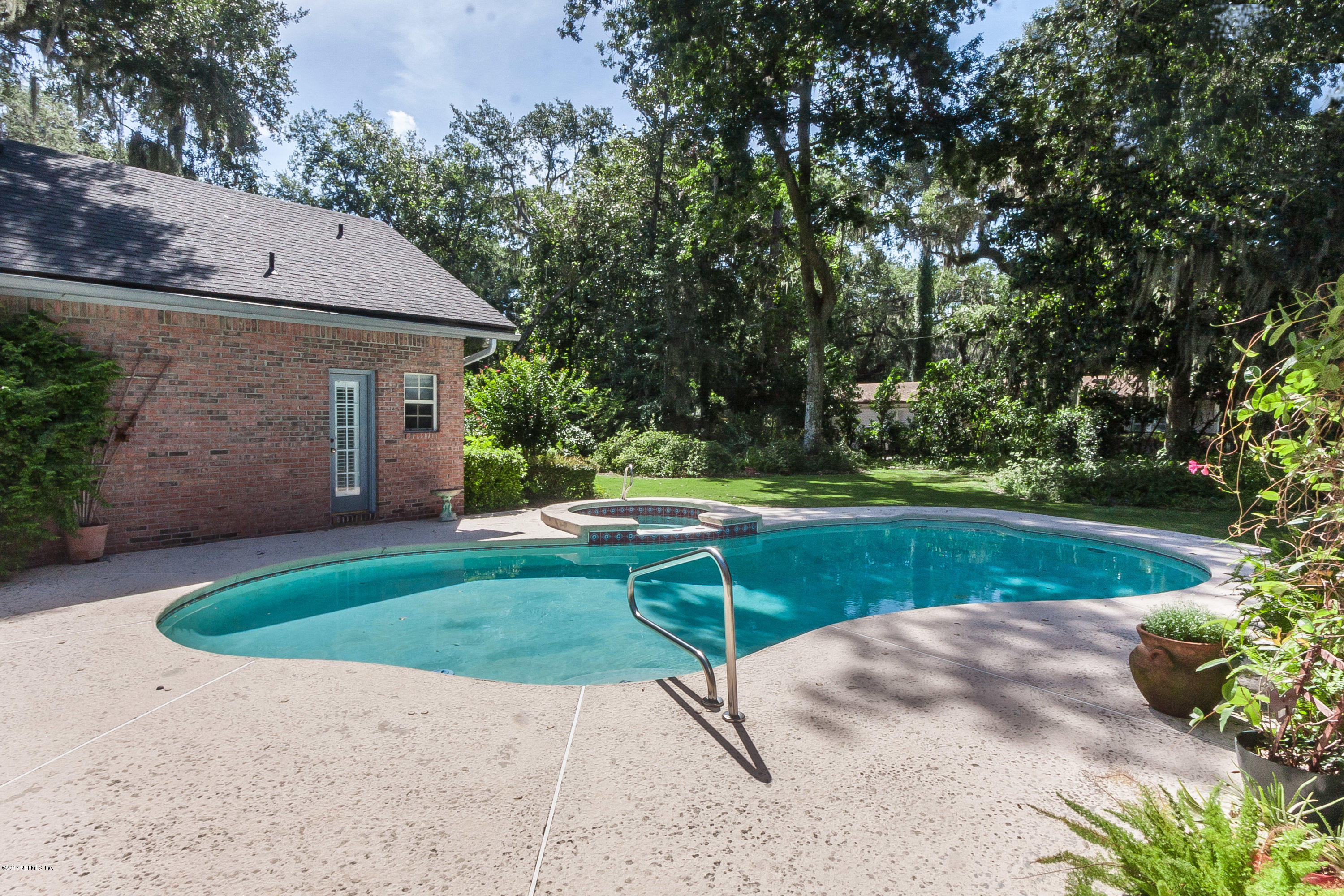 2720 Beauclerc Road Jacksonville, FL 32257 - Photo 38 of 45 a view of backyard with trampoline