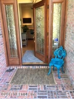 2720 Beauclerc Road Jacksonville, FL 32257 - Photo 5 of 45 a view of a hallway with furniture and a window
